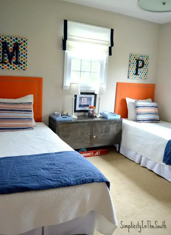 Boy's orange and blue shared bedroom by Simplicity In The South.