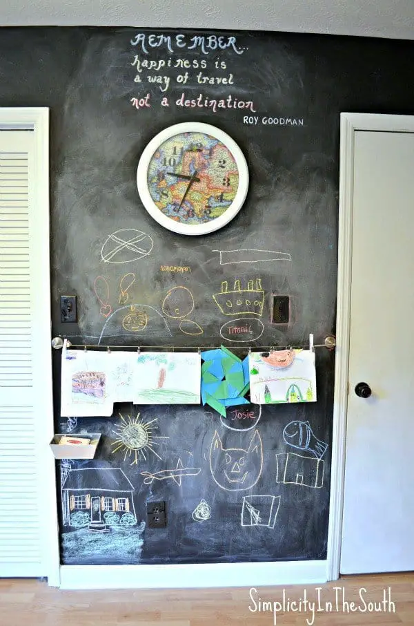 Chalkboard wall and art display. Boy's shared bedroom by Simplicity In The South.