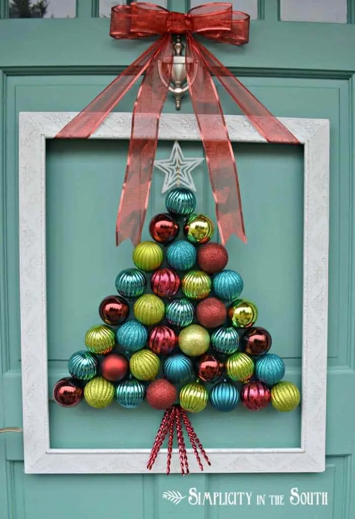 This is an adorable idea! This tutorial shows you how to make a DIY framed Christmas ornament wreath that looks like a Christmas tree!