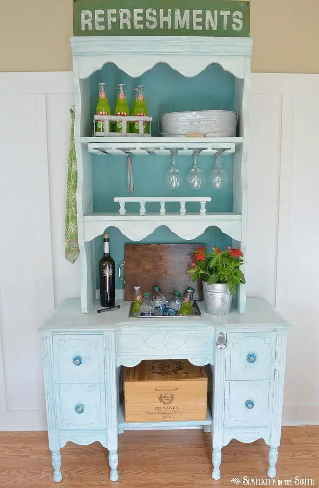 Beverage station made from a hutch and desk.