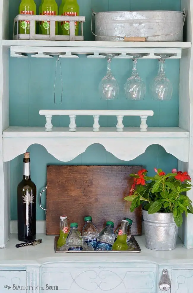 Repurposed desk and hutch made into a beverage station