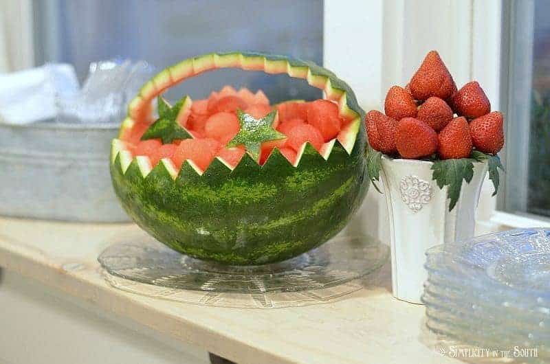 Carved watermelon basket and strawberry bouquet
