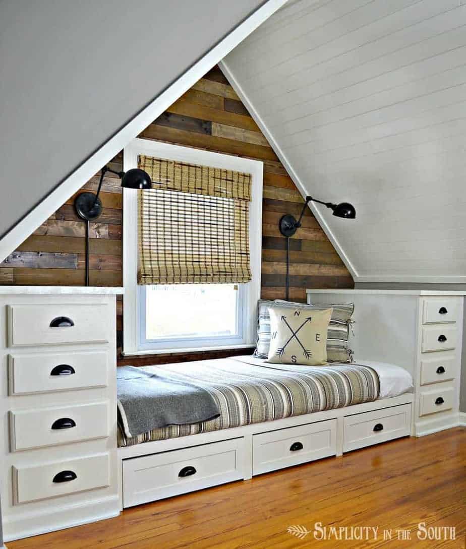 Cozy built in bed with tons of storage! Love the planked wall treatment