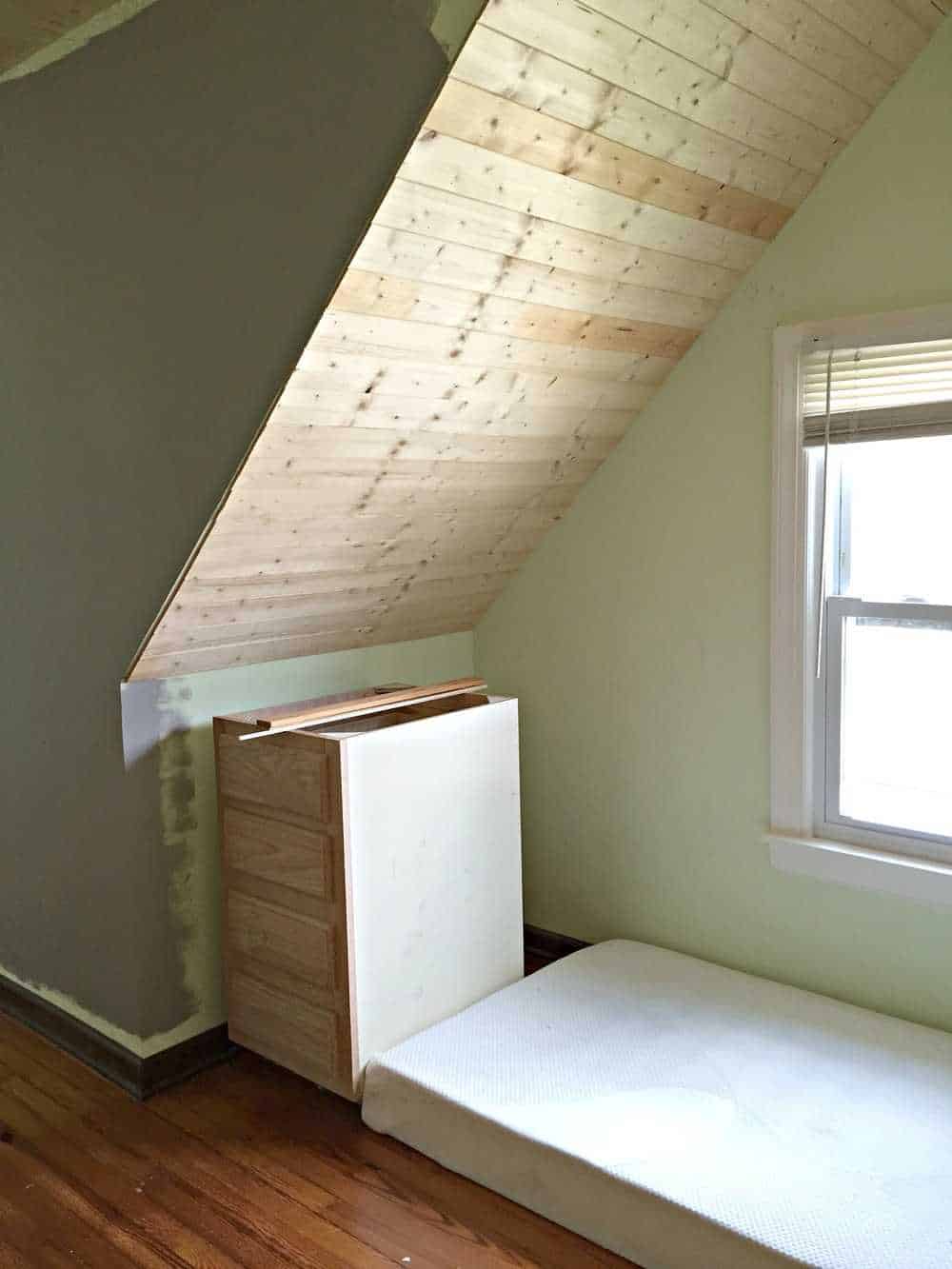 covering-popcorn-ceilings-in-the-attic-bedroom