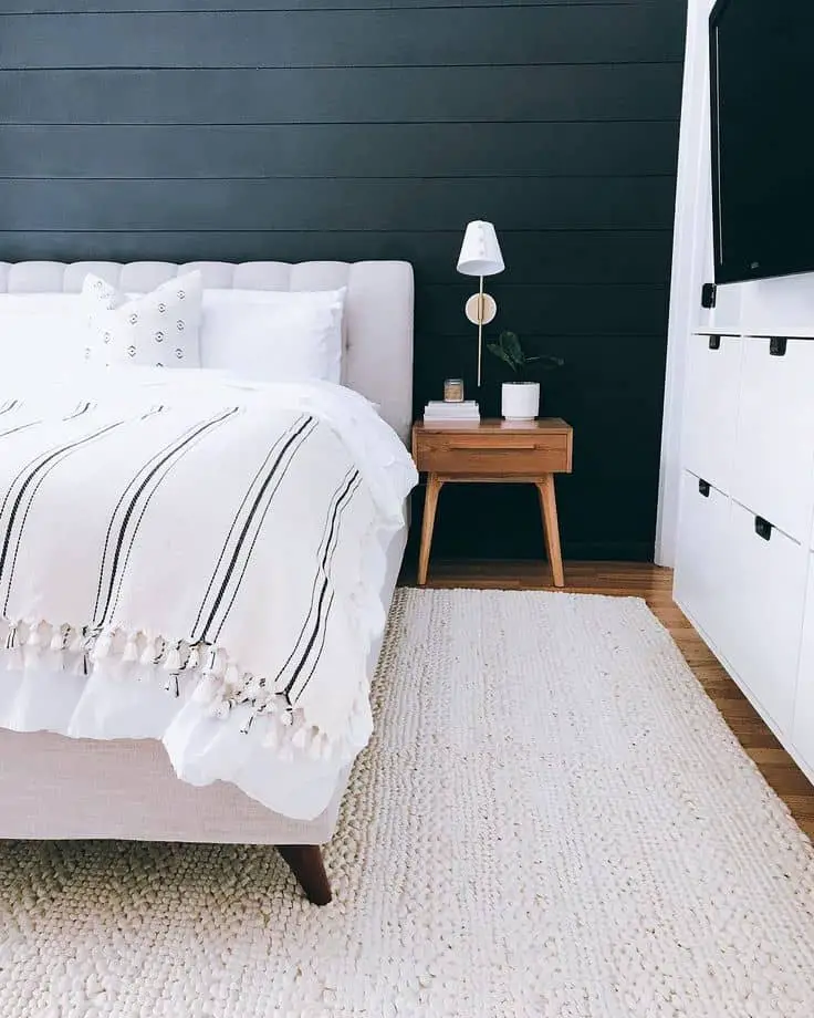 bedroom design idea with black shiplap wall from Restoring Home on Instagram