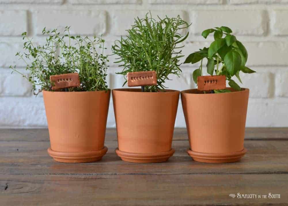 how to make stamped copper metal plant markers for an herb garden