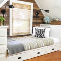 How to Make a Built-in Bed Using Kitchen Cabinets & a Rustic Planked Wall