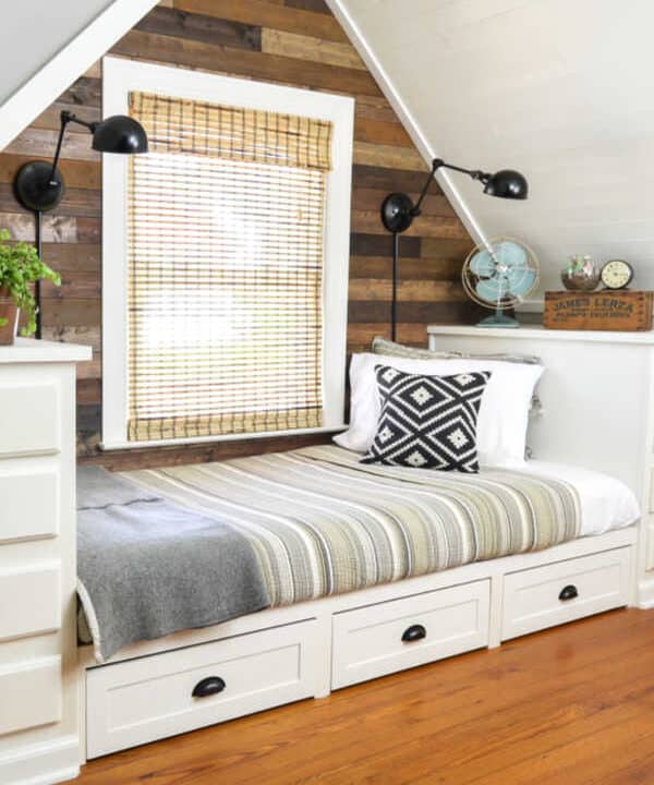 How to Make a Built-in Bed Using Kitchen Cabinets & a Rustic Planked Wall